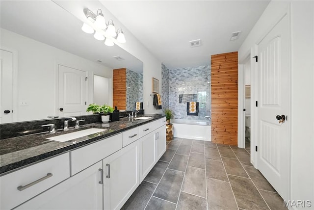 713 Alban Aly, Ofallon, MO 63368 - full bathroom with double vanity, a bath, toilet, a shower, and tile patterned floors