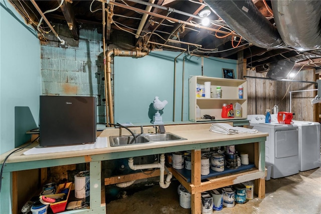 669 Park Ave, Sikeston, MO 63801 - unfinished basement with washer and clothes dryer and a sink