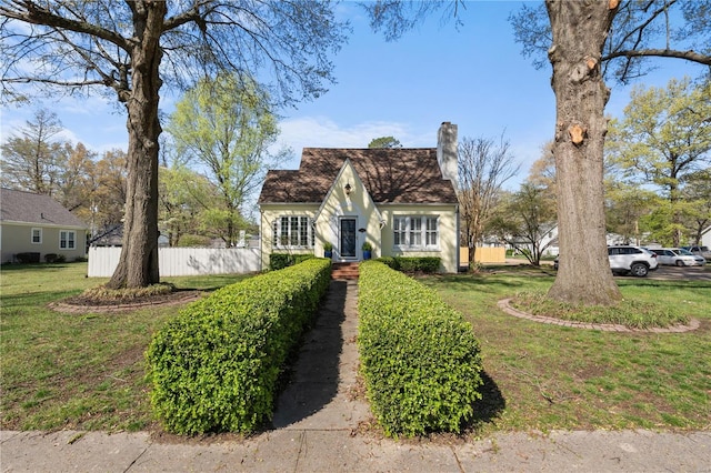 669 Park Ave, Sikeston, MO 63801 - view of front of property featuring a chimney and stucco siding