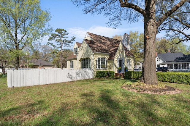 669 Park Ave, Sikeston, MO 63801 - view of side of home with a chimney