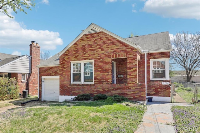 8724 Magdalen Ave, Saint Louis, MO 63144 - view of front of home with brick siding, a shingled roof, a garage, and a gate