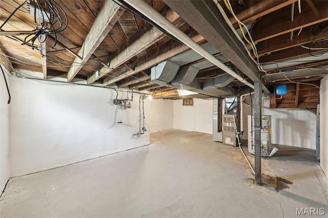 8724 Magdalen Ave, Saint Louis, MO 63144 - unfinished basement featuring heating unit