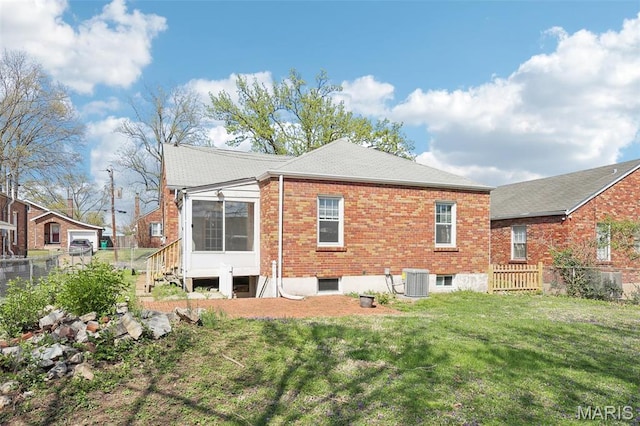 8724 Magdalen Ave, Saint Louis, MO 63144 - rear view of property featuring central AC unit and brick siding