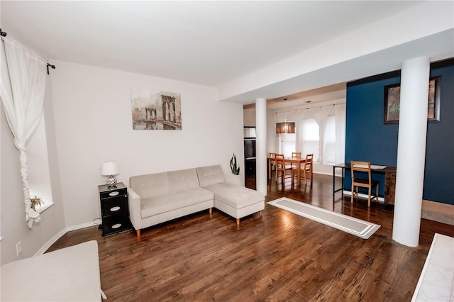 5507 Waterman Blvd Unit C, Saint Louis, MO 63112 - living room featuring wood finished floors and baseboards