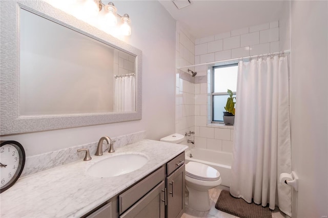 5507 Waterman Blvd Unit C, Saint Louis, MO 63112 - bathroom featuring toilet, shower / tub combo with curtain, and vanity