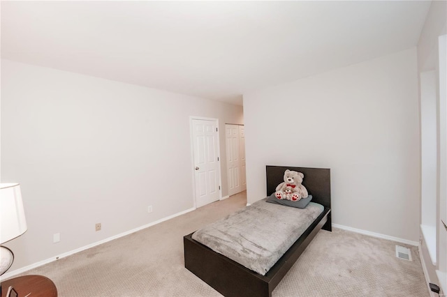 5507 Waterman Blvd Unit C, Saint Louis, MO 63112 - bedroom featuring light colored carpet and baseboards