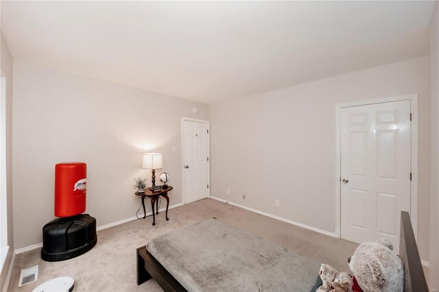 5507 Waterman Blvd Unit C, Saint Louis, MO 63112 - living area with carpet and baseboards