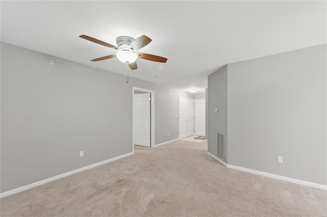 430 Benton Dr Unit C, Saint Peters, MO 63376 - spare room featuring a ceiling fan, light carpet, and baseboards