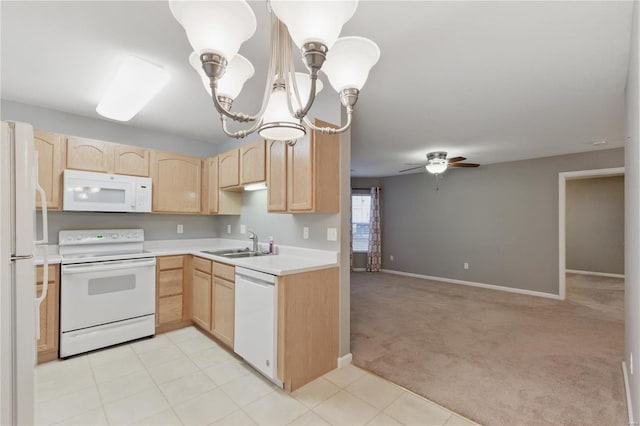 430 Benton Dr Unit C, Saint Peters, MO 63376 - kitchen with white appliances, light brown cabinetry, a sink, and light countertops