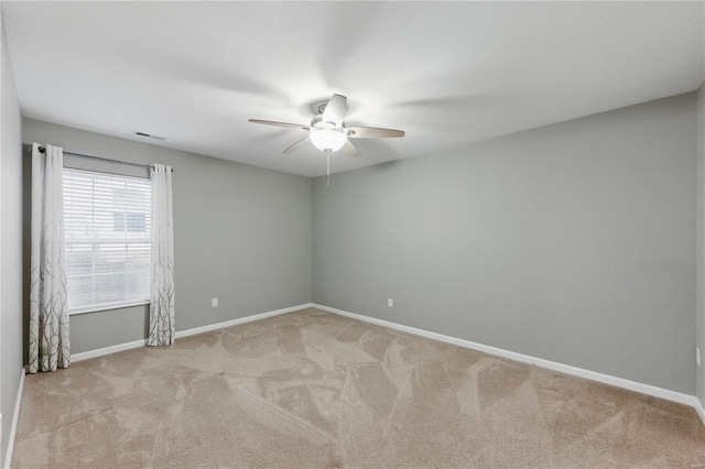 430 Benton Dr Unit C, Saint Peters, MO 63376 - spare room with a ceiling fan, light carpet, and baseboards