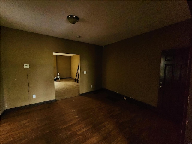 4052 Detonty St, Saint Louis, MO 63110 - empty room with wood finished floors and baseboards