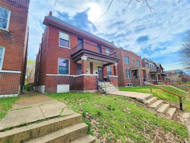 4052 Detonty St, Saint Louis, MO 63110 - multi unit property with a balcony, brick siding, and covered porch