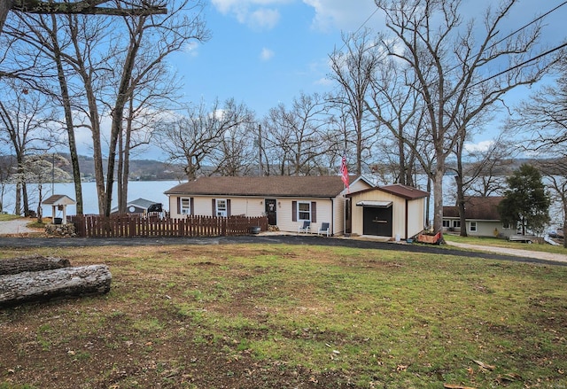 15 Allen Cir, Sunrise Beach, MO 65079 - ranch-style home featuring a water view and a chimney