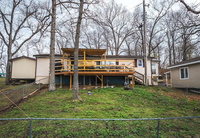 15 Allen Cir, Sunrise Beach, MO 65079 - back of house featuring a deck and a fenced backyard
