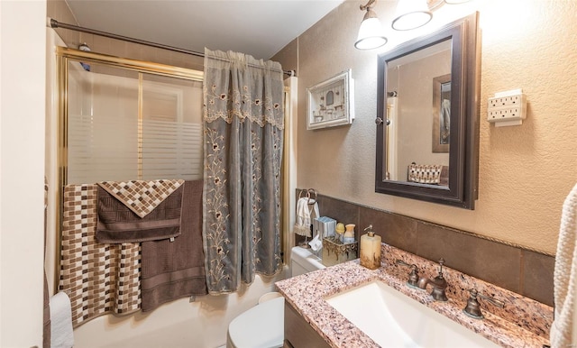 15 Allen Cir, Sunrise Beach, MO 65079 - full bath with a textured wall, toilet, and vanity
