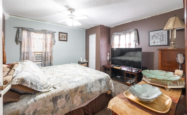 15 Allen Cir, Sunrise Beach, MO 65079 - bedroom with a textured ceiling, a closet, ceiling fan, carpet flooring, and ornamental molding