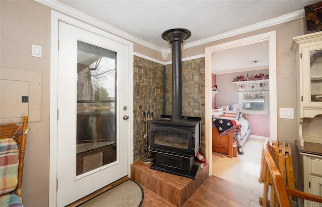 15 Allen Cir, Sunrise Beach, MO 65079 - living room featuring a wood stove, wood finished floors, ornamental molding, a textured ceiling, and electric panel