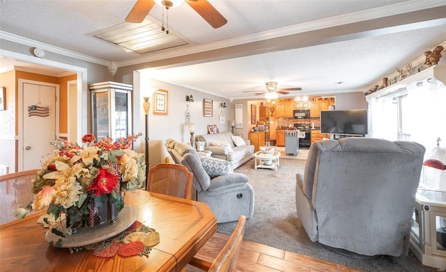 15 Allen Cir, Sunrise Beach, MO 65079 - living area featuring a ceiling fan, a textured ceiling, ornamental molding, and light wood-style floors