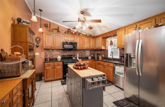 15 Allen Cir, Sunrise Beach, MO 65079 - kitchen with black appliances, ceiling fan, backsplash, light tile patterned floors, and crown molding