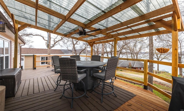 15 Allen Cir, Sunrise Beach, MO 65079 - wooden terrace featuring ceiling fan, a pergola, outdoor dining area, and a water view