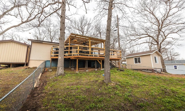 15 Allen Cir, Sunrise Beach, MO 65079 - rear view of house featuring a deck, a ceiling fan, a fenced backyard, and stairs
