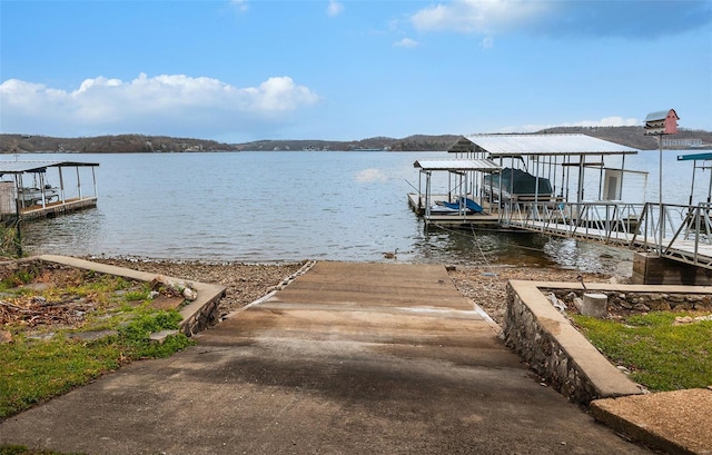 15 Allen Cir, Sunrise Beach, MO 65079 - dock area featuring a boat ramp and a water view