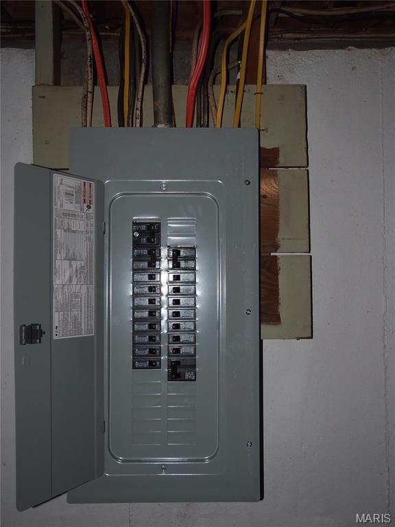 utility room featuring electric panel