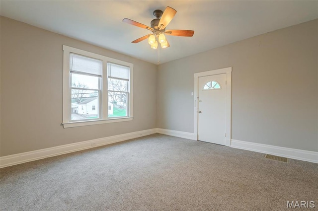338 Horn Ave, Saint Louis, MO 63125 - foyer with carpet floors, ceiling fan, and baseboards