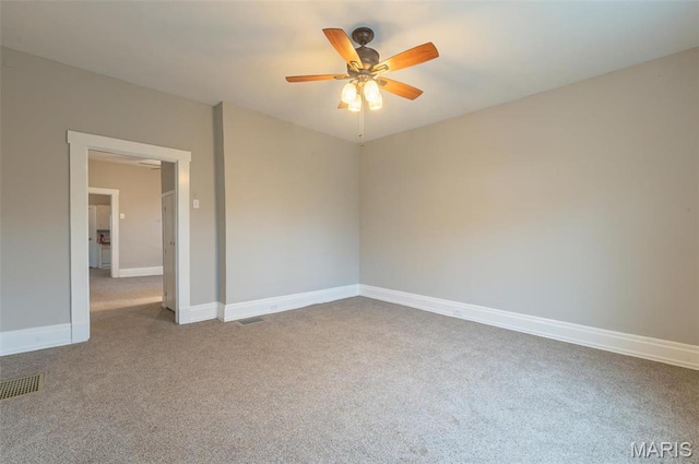 338 Horn Ave, Saint Louis, MO 63125 - carpeted empty room with ceiling fan and baseboards