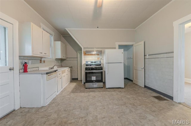 338 Horn Ave, Saint Louis, MO 63125 - kitchen featuring white appliances, exhaust hood, a sink, light floors, and light countertops