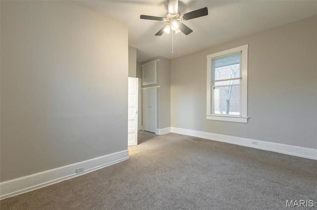 338 Horn Ave, Saint Louis, MO 63125 - carpeted empty room featuring baseboards and a ceiling fan