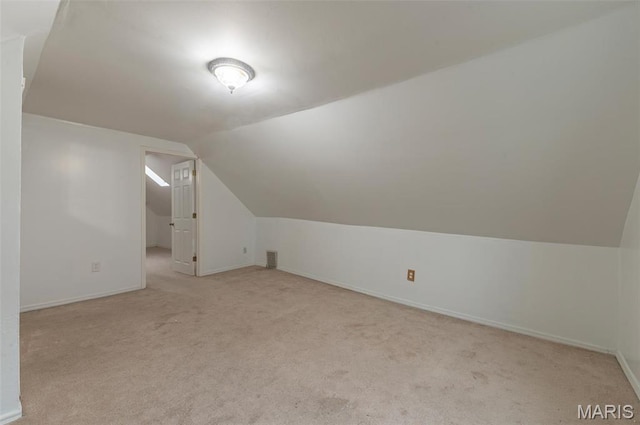338 Horn Ave, Saint Louis, MO 63125 - additional living space featuring carpet, vaulted ceiling, and baseboards
