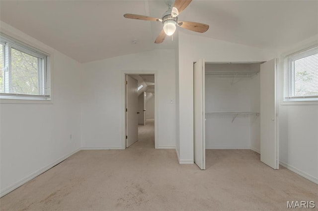 338 Horn Ave, Saint Louis, MO 63125 - unfurnished bedroom featuring carpet floors, vaulted ceiling, a closet, baseboards, and a ceiling fan