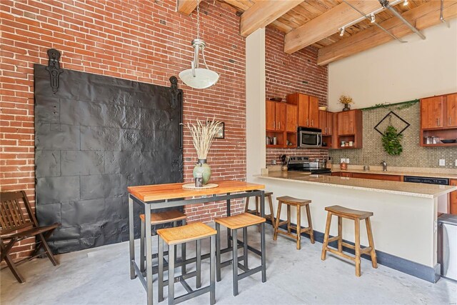 kitchen with electric range, stainless steel microwave, finished concrete flooring, open shelves, and brown cabinets