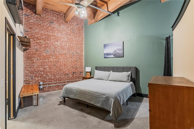bedroom featuring brick wall, wood ceiling, beam ceiling, concrete floors, and a ceiling fan