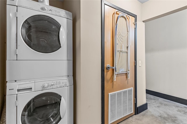 washroom featuring estacked washer and dryer