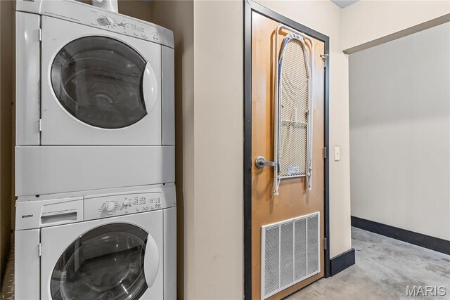 1123 Washington Ave Unit 305, Saint Louis, MO 63101 - laundry area featuring stacked washer and clothes dryer
