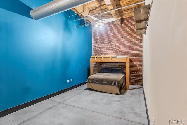 1123 Washington Ave Unit 305, Saint Louis, MO 63101 - unfurnished bedroom with brick wall and concrete floors