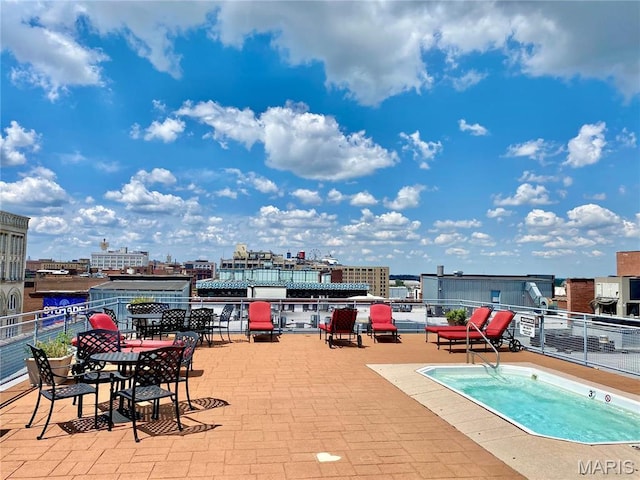 1123 Washington Ave Unit 305, Saint Louis, MO 63101 - view of pool with a city view and a patio area