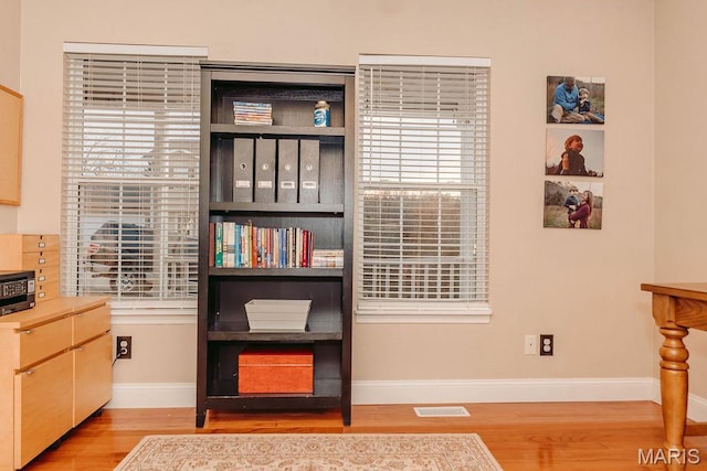 17145 Lensman Rd, Saint Robert, MO 65584 - living area featuring wood finished floors and baseboards