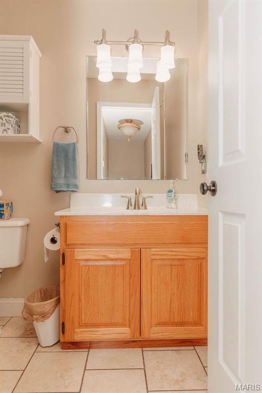 17145 Lensman Rd, Saint Robert, MO 65584 - bathroom featuring tile patterned flooring and vanity