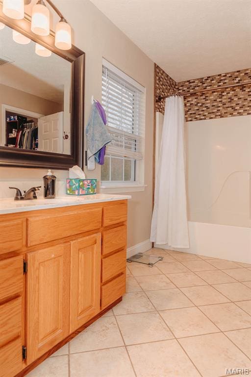 17145 Lensman Rd, Saint Robert, MO 65584 - bathroom with tile patterned flooring, vanity, and shower / bath combination with curtain