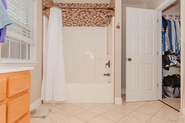 17145 Lensman Rd, Saint Robert, MO 65584 - full bath featuring tile patterned flooring, shower / bath combo, and a spacious closet