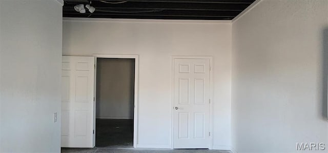 17145 Lensman Rd, Saint Robert, MO 65584 - unfurnished bedroom with baseboards and concrete flooring