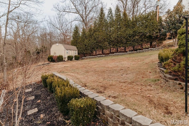 17145 Lensman Rd, Saint Robert, MO 65584 - view of green lawn with a shed and an outbuilding