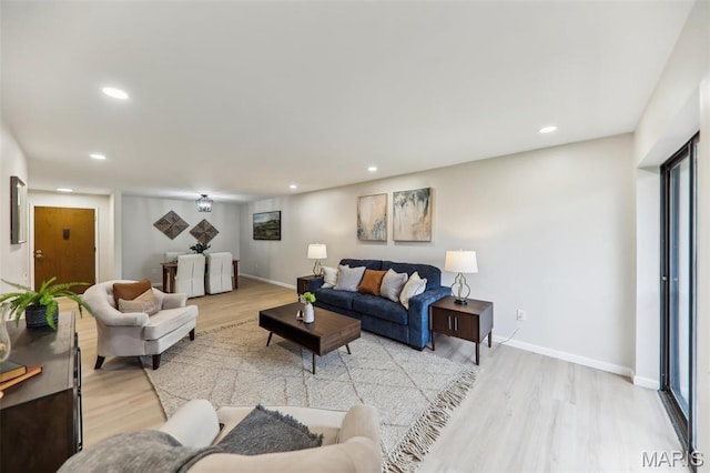 539 Coeur De Royale Dr Unit 201, Saint Louis, MO 63141 - living area with light wood finished floors, recessed lighting, and baseboards
