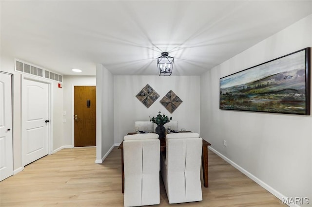 539 Coeur De Royale Dr Unit 201, Saint Louis, MO 63141 - dining area featuring light wood-style floors and baseboards