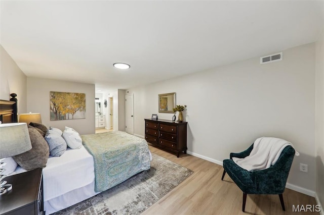 539 Coeur De Royale Dr Unit 201, Saint Louis, MO 63141 - bedroom with light wood-type flooring and baseboards