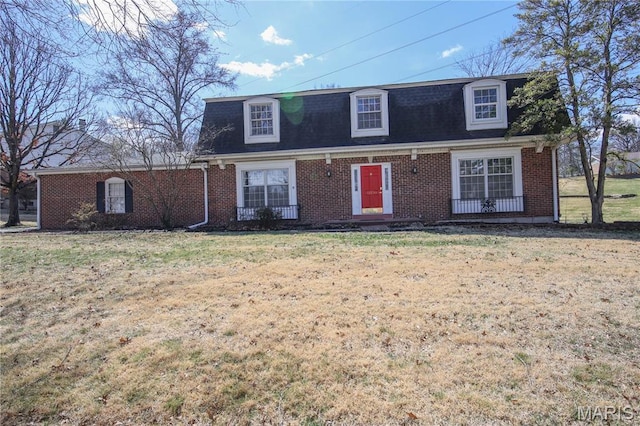 12530 Trammell Ct, Creve Coeur, MO 63141 - view of front facade featuring a front yard, brick siding, and a shingled roof