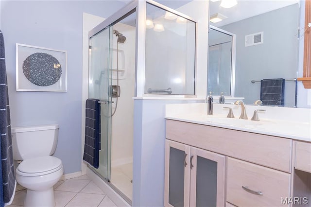 12530 Trammell Ct, Creve Coeur, MO 63141 - bathroom featuring a stall shower, toilet, tile patterned flooring, vanity, and baseboards